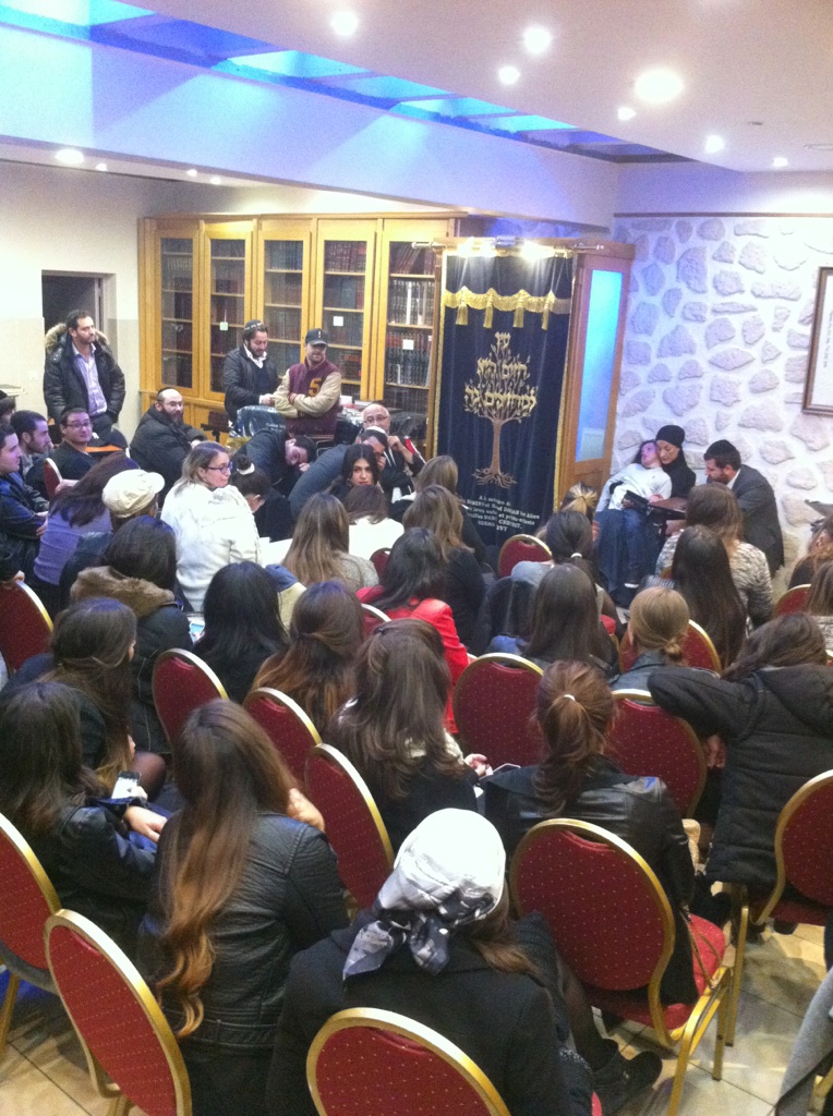 An assembly gathered around Shmouel.