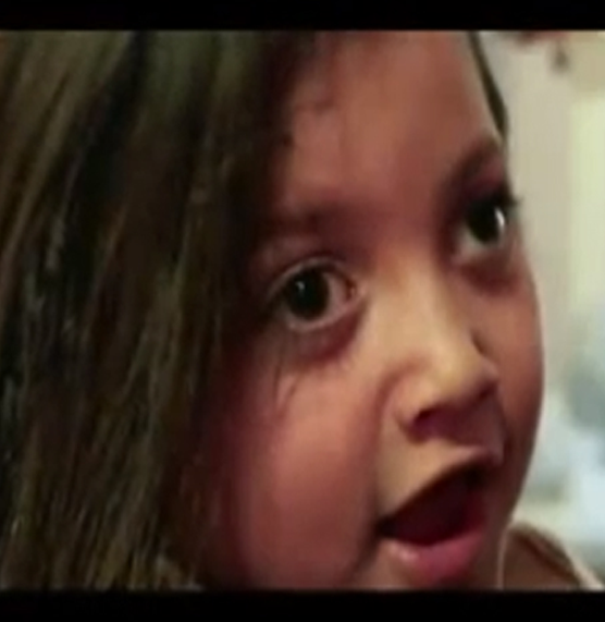 Shmouel’s face in extreme close-up.