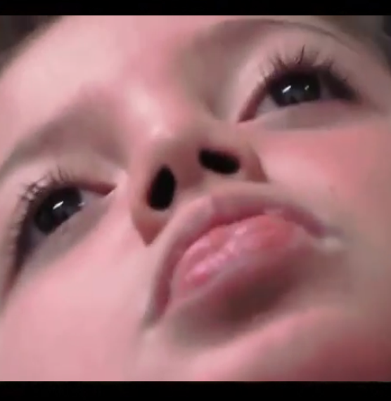 Shmouel’s face in close-up.